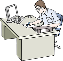 Ein Mann arbeitet am Computer.