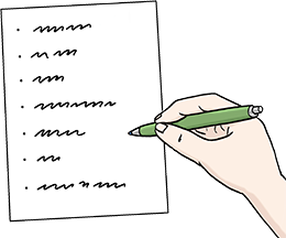 Jemand schreibt etwas auf ein Blatt Papier.